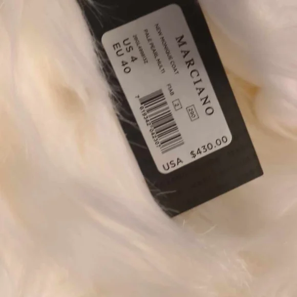 3 fur coats. 1 is shorter than the other 2 and 2 are the same.